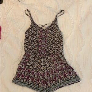 Brown multicolor romper with criss cross lace back